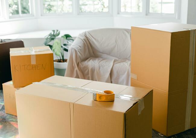 Packing boxes with room names on